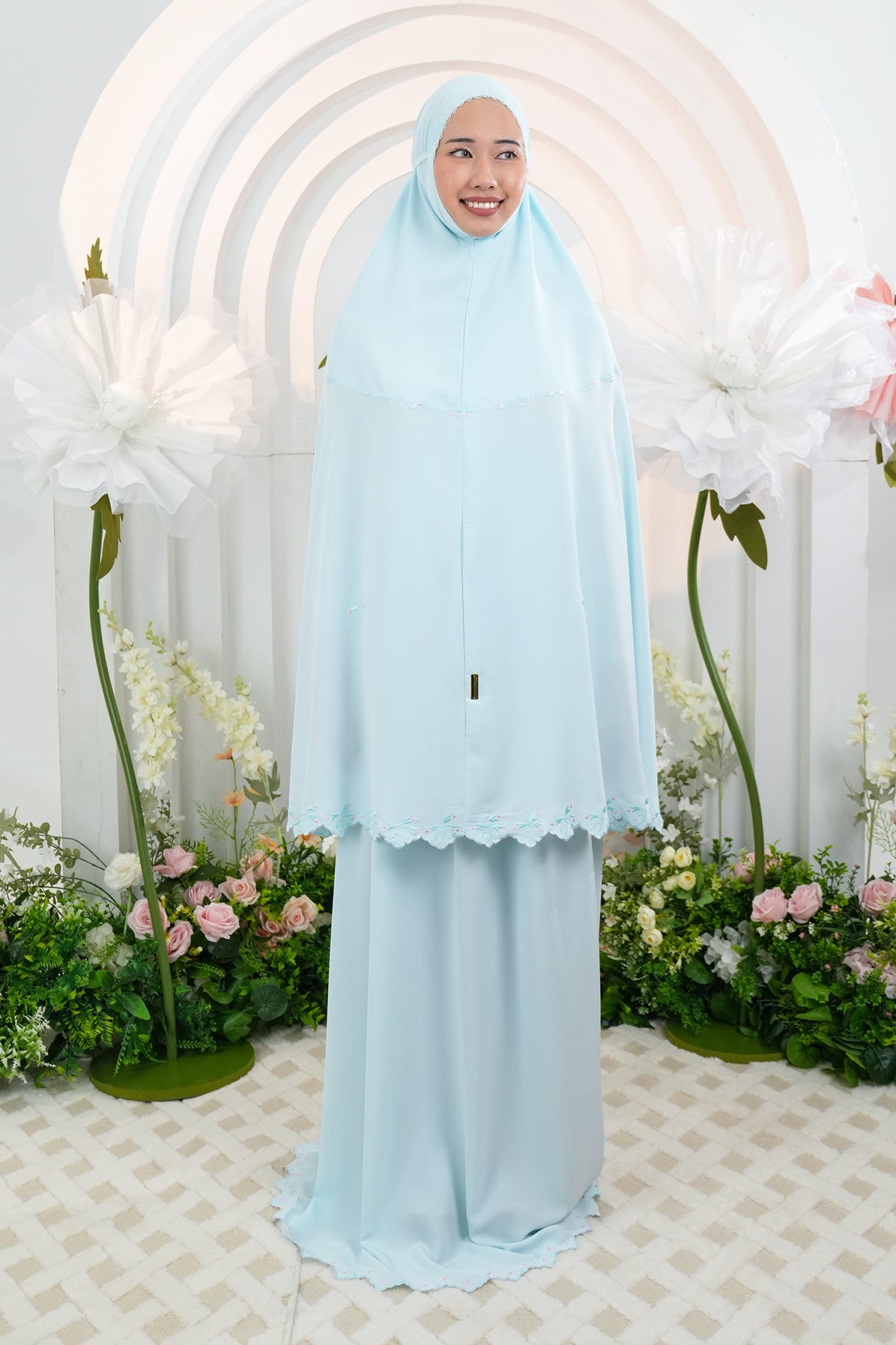 Dalia in Blue Prayer Wear