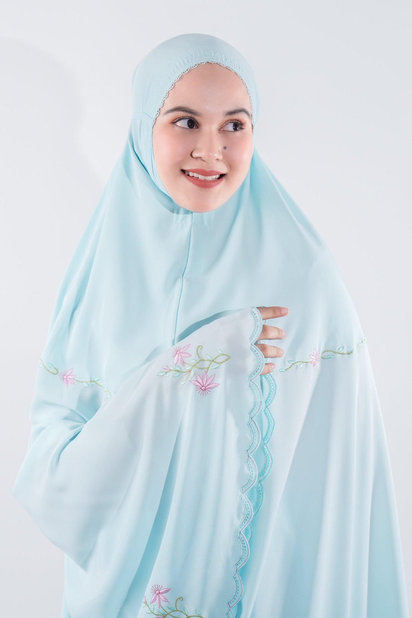 Guzel In Blue Prayer Wear