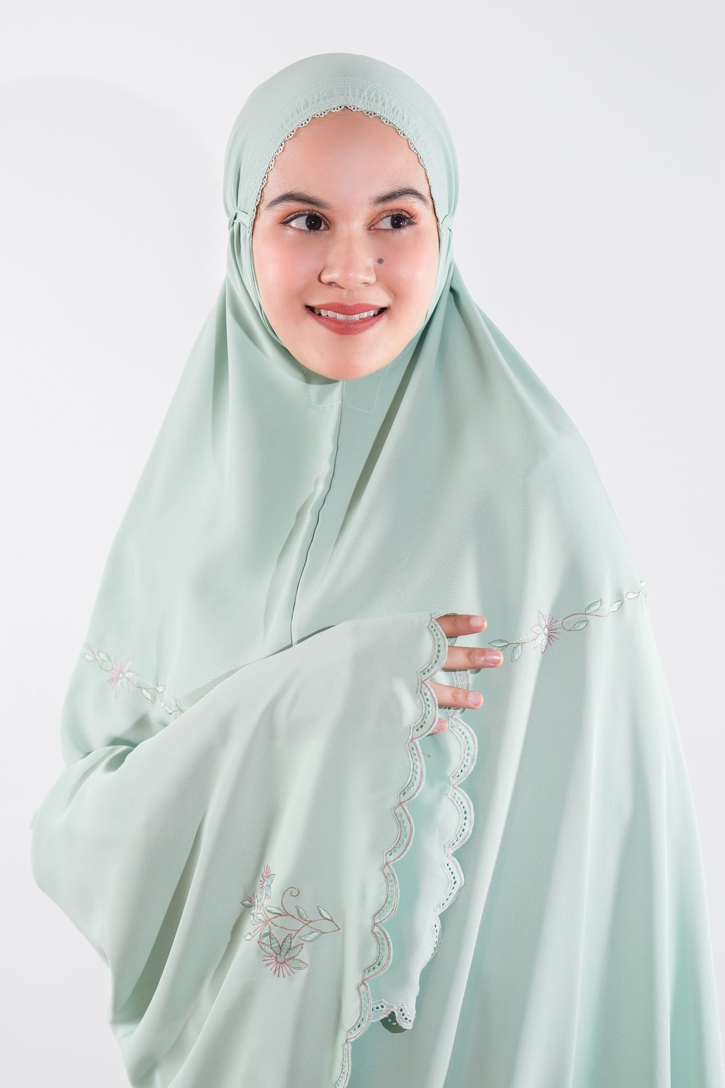 Guzel In Green Prayer Wear