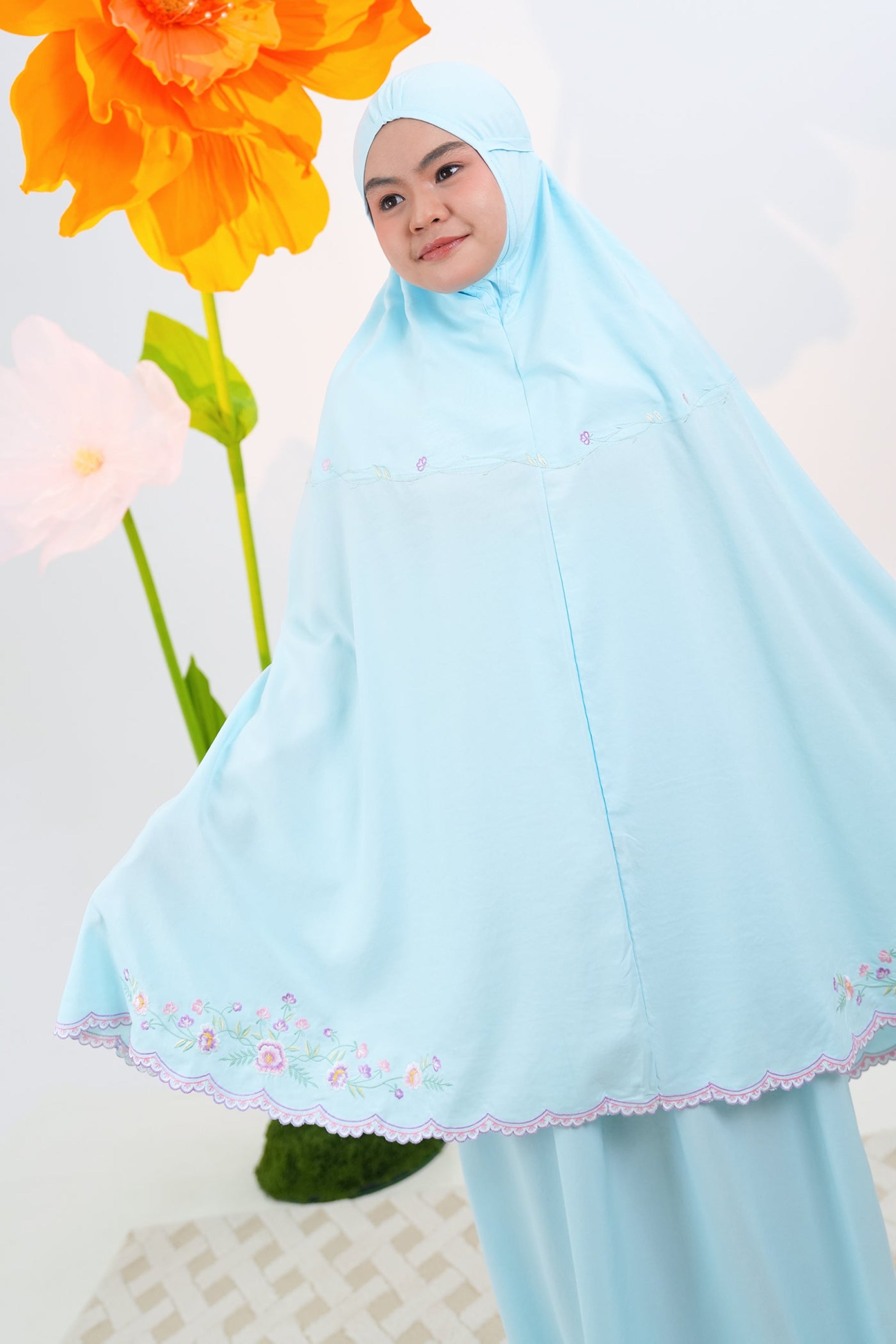 Leora in Blue Prayer Wear