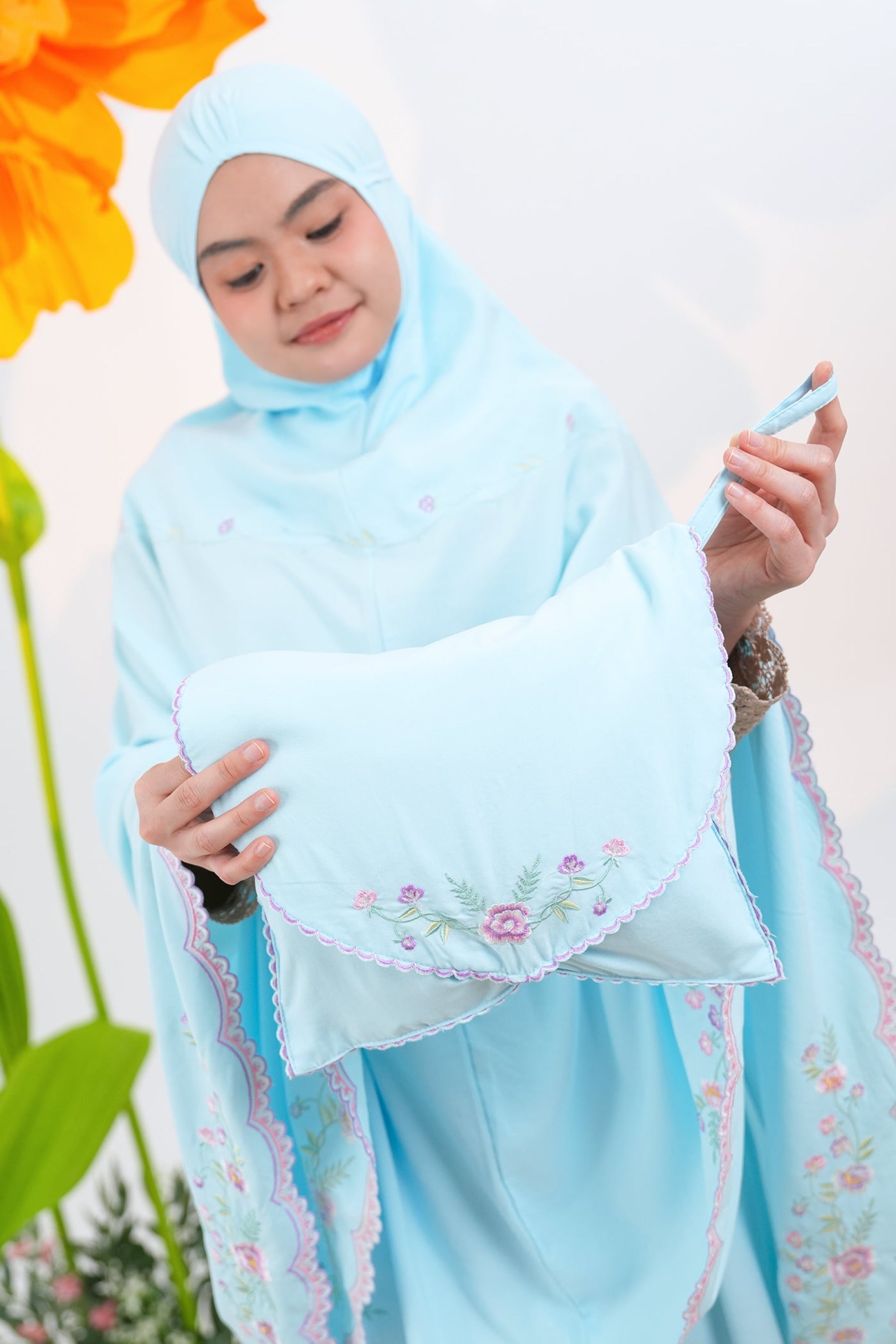 Leora in Blue Prayer Wear