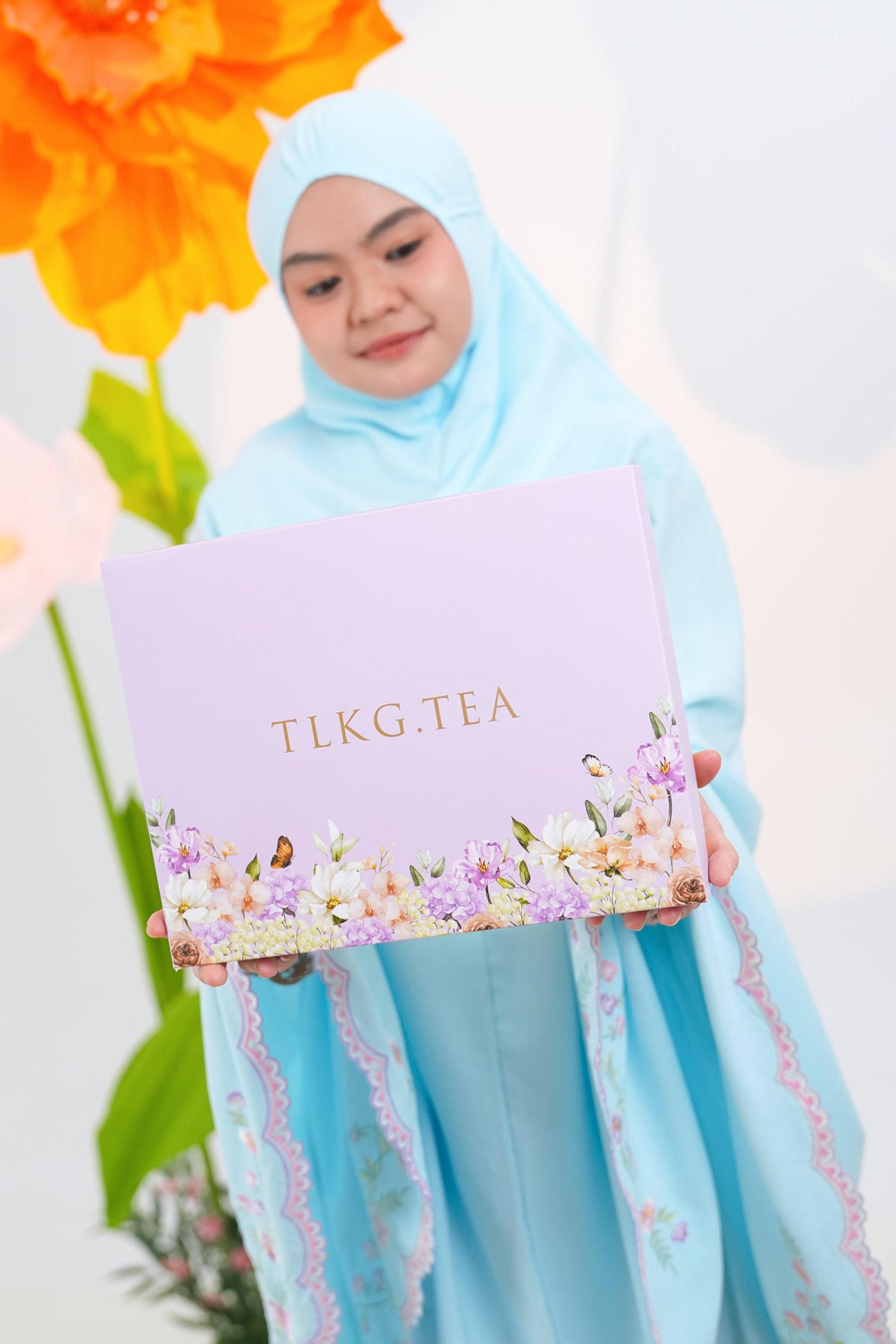 Leora in Blue Prayer Wear