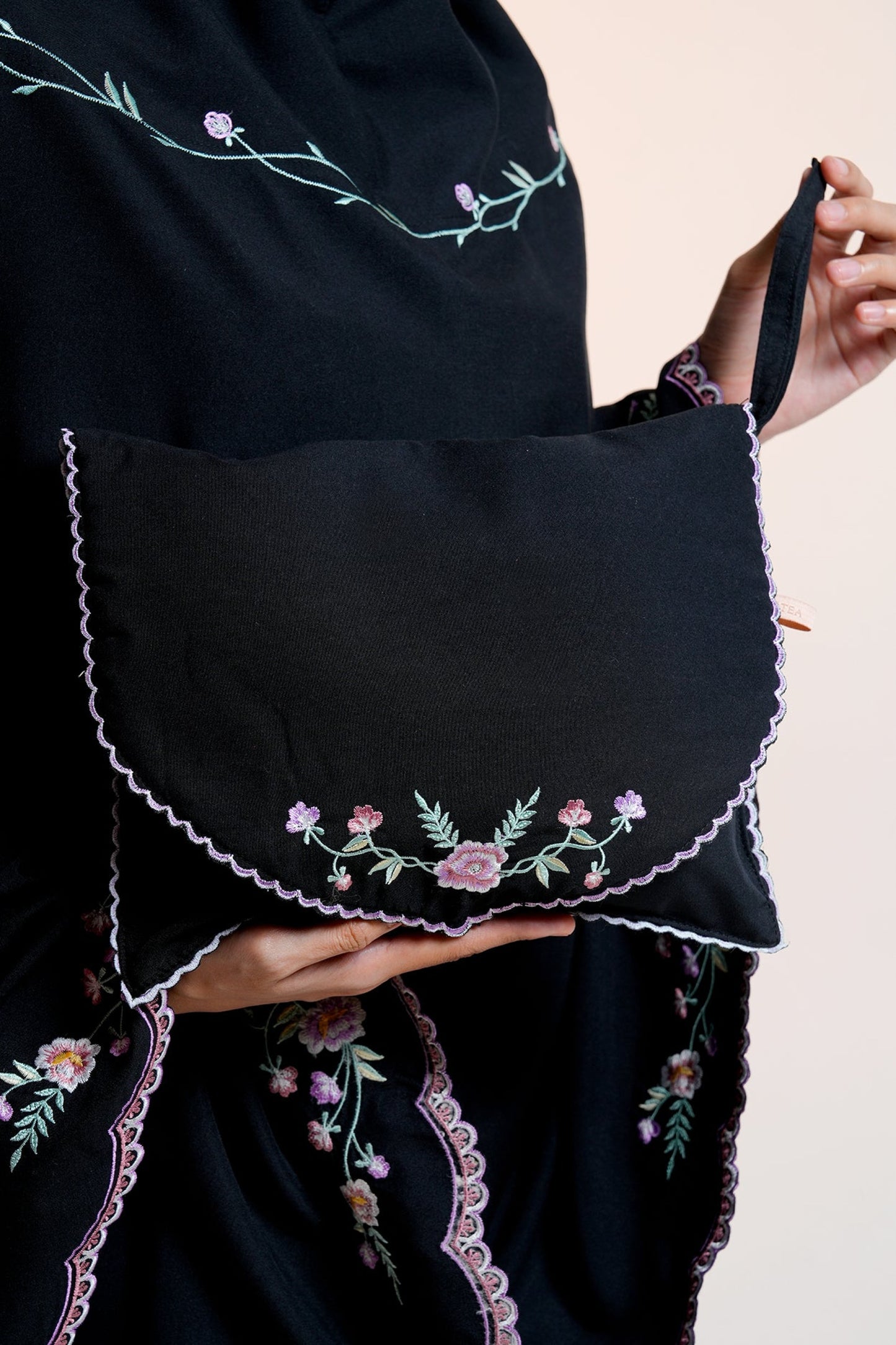 Leora in Black Prayer Wear