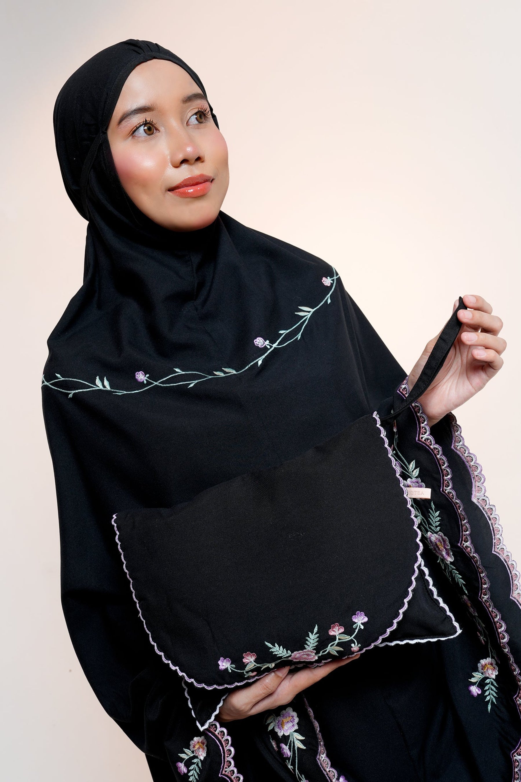 Leora in Black Prayer Wear